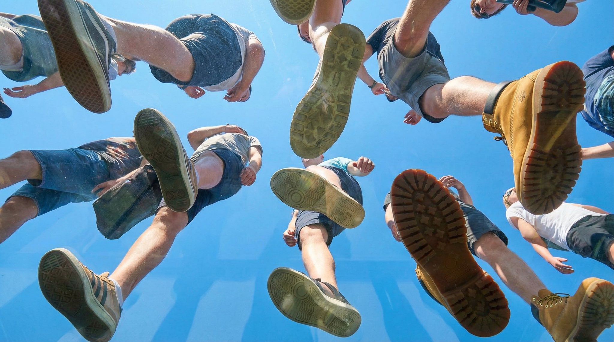 View from under a plane of completely transparent plexiglass. We are…