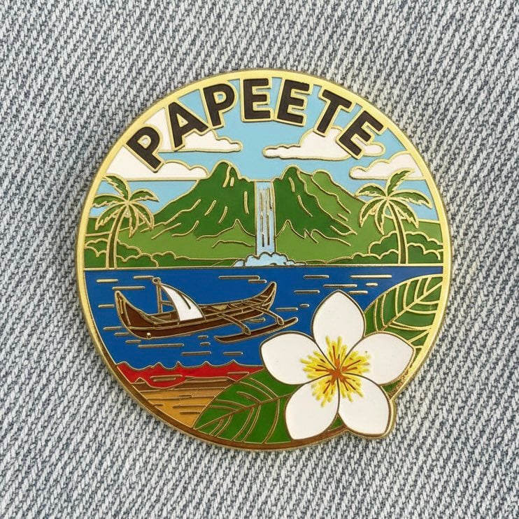 Close-up photo of a collectible enamel pin of [CITY], gold-plated met…