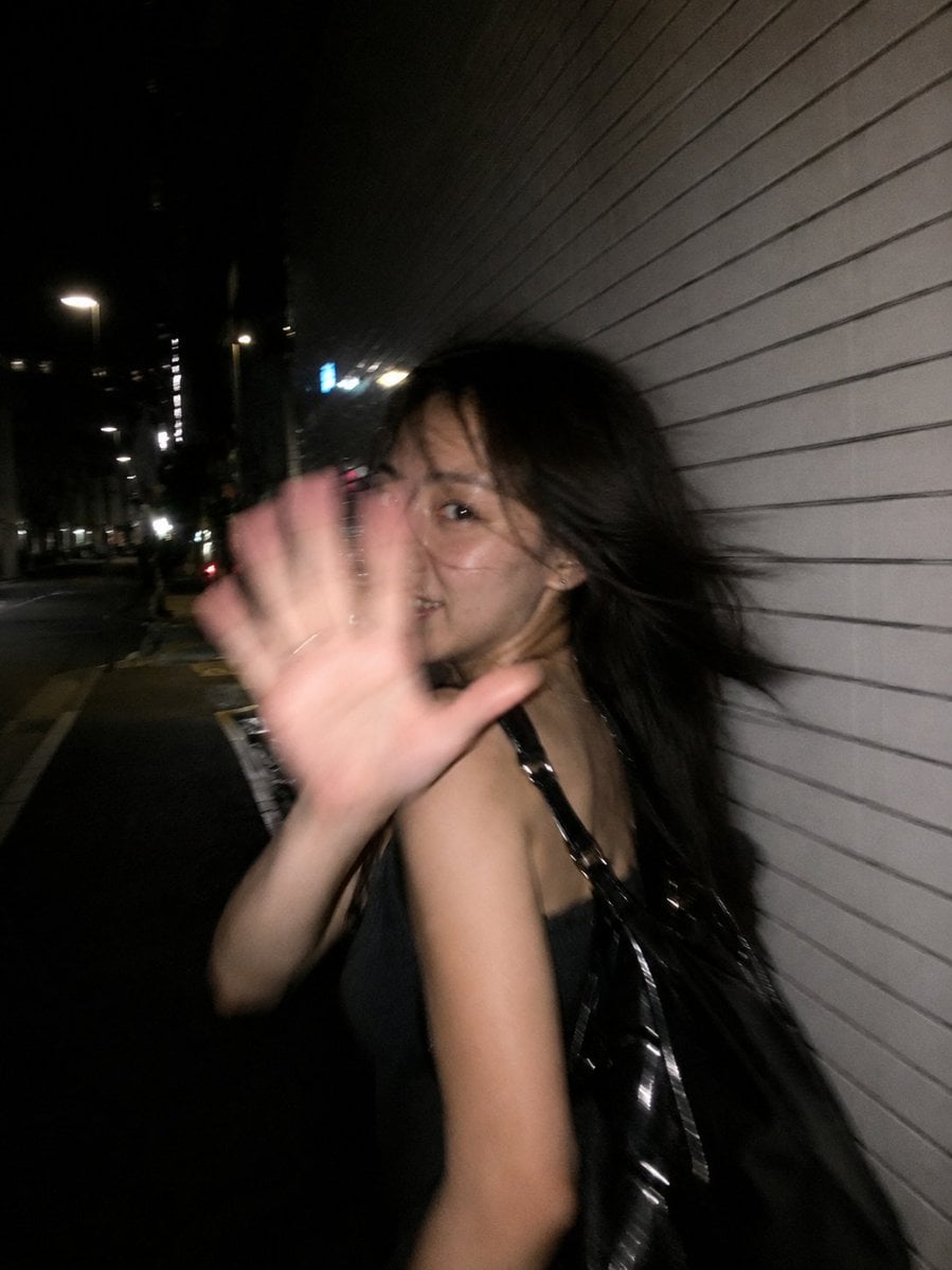 Ultra-realistic candid smartphone flash photograph, portrait orientat…