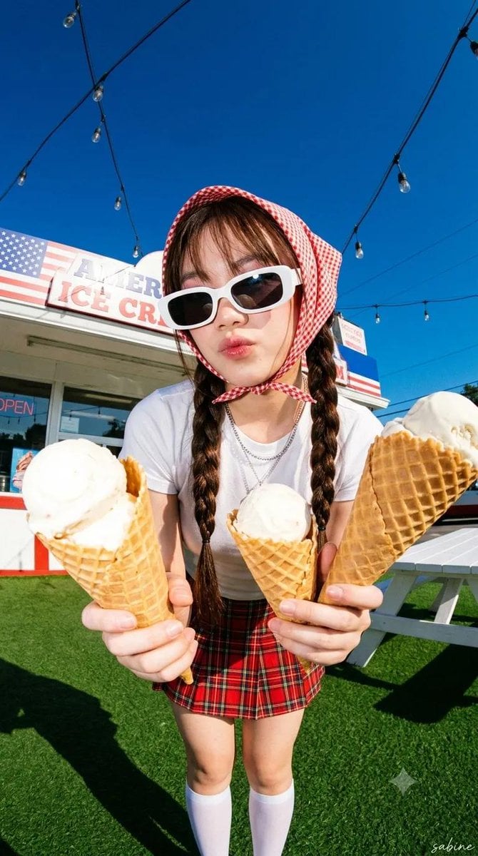 Ultra realistic Y2K summer fashion editorial, young woman wearing white fitted tank top, red plaid mini skirt…