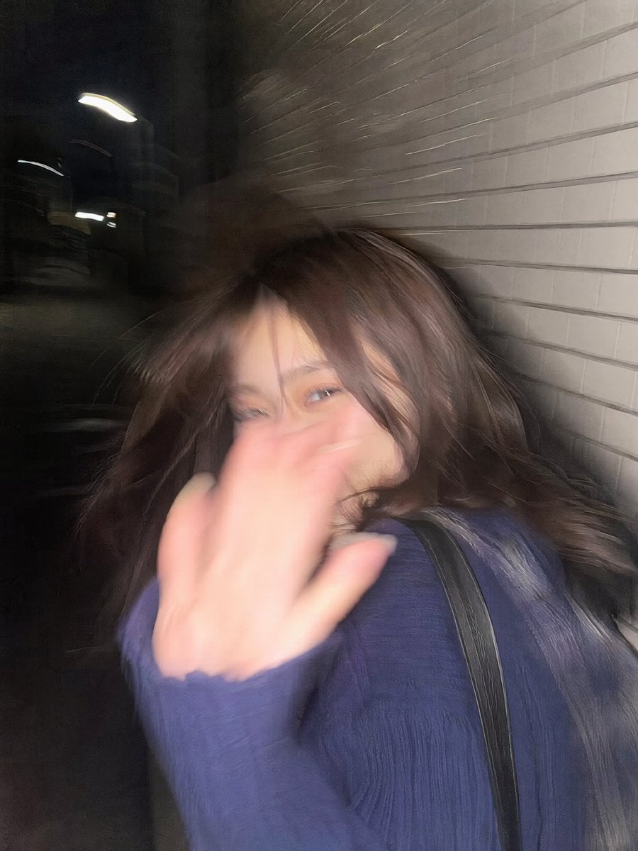 Ultra-realistic candid smartphone photo 3 4 vertical. Original non-identifiable young woman inspired only by…