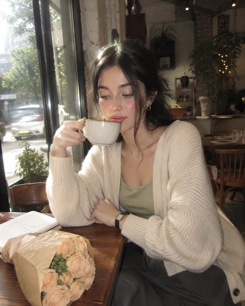 Create an ultra-realistic nostalgic café portrait captured on a premi…