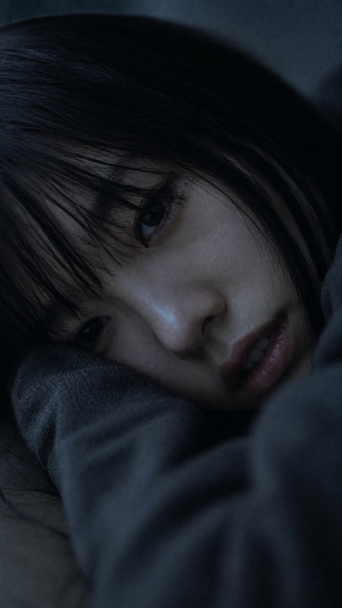 Portrait shot on 85mm f/1.2, close-up of a Japanese woman in her earl…