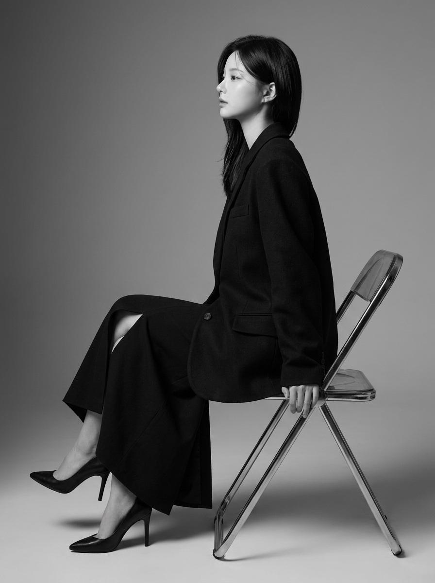 Create a highly realistic 8K professional black-and-white fashion edi…